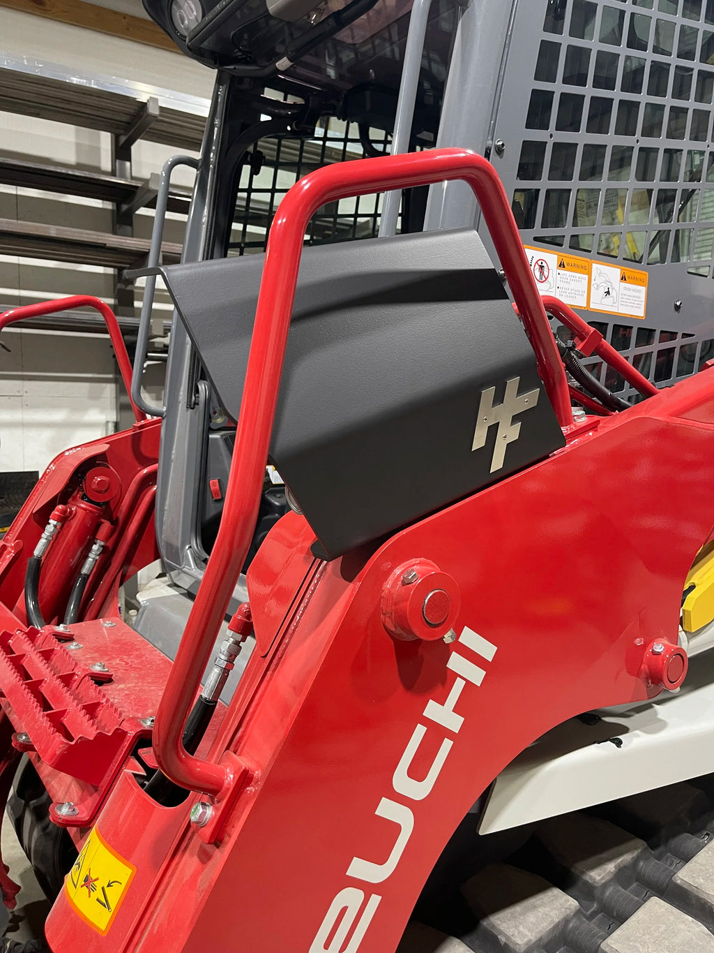 Takeuchi TL8R2 Auxiliary Hydraulic Coupler Guard